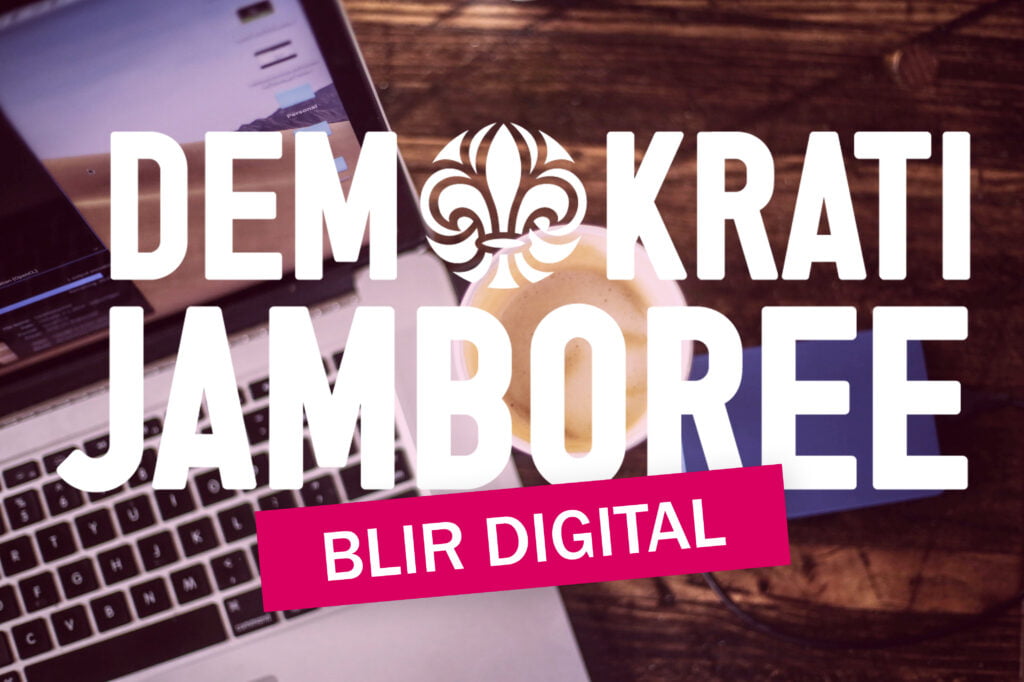 Text demokrati jamboree blir digital, i bakgrunden laptop och kaffekopp
