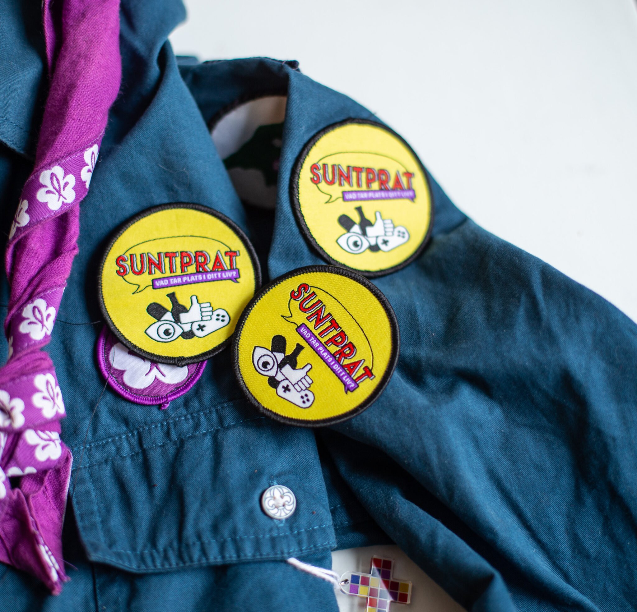 Tygmärke för Suntprat på scoutskjorta